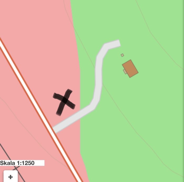 Markkarta med grön och rosa färg samt ett svart kryss där användaren grävt för att visa icke-fastmark.