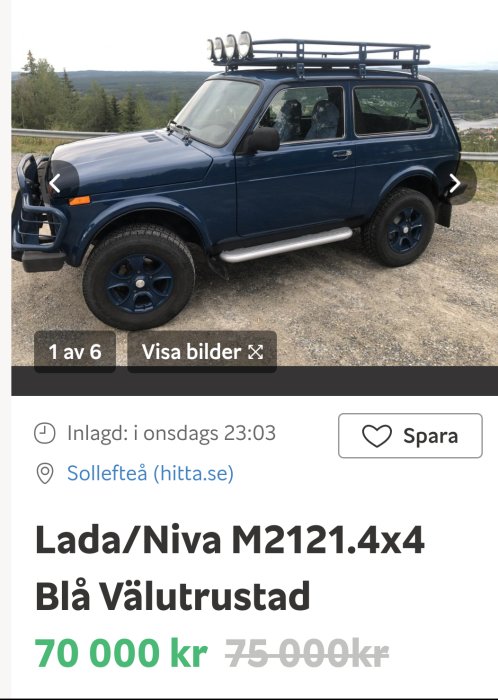 Blå Lada Niva 4x4 med extraljus på taket och bullbar, parkerad utomhus.