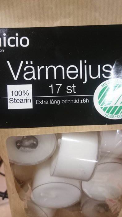 Förpackning av värmejus med texten "Extra lång brinntid +6h" och "100% Stearin".