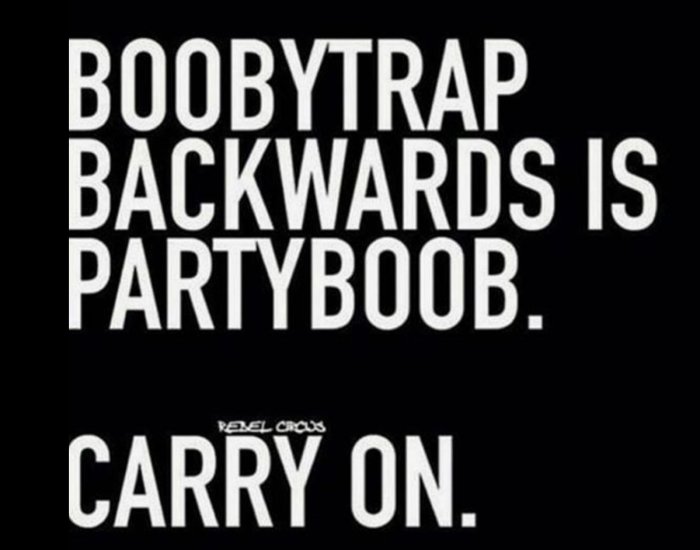 Svartvit textbild med orden "BOOBYTRAP BACKWARDS IS PARTYBOOB. CARRY ON.