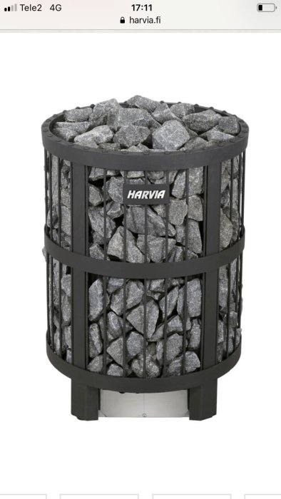 Svart bastuugn fylld med gråa lavastenar.