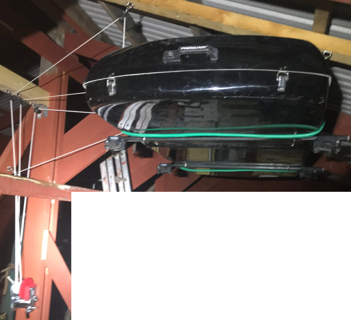 Upphängd takbox i garage med rep, vinsch och surrningsfästen.