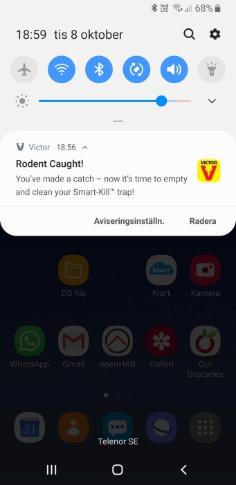 Smartphone-skärm visar notis om fångad gnagare från Victor Smart-Kill WiFi fälla.