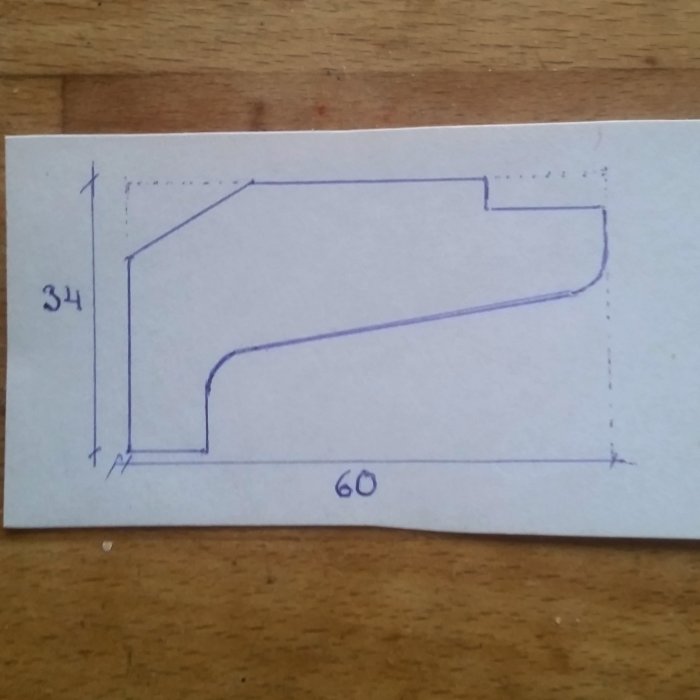 Handritad skiss av en taklist med måtten 34x60 mm.