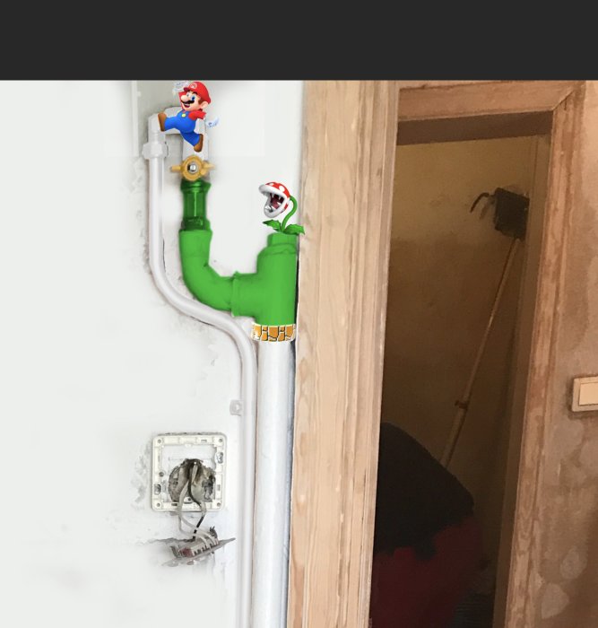 Kopparrör för gasinstallation längs en vit vägg med utklippta figurer av Mario och Luigi.