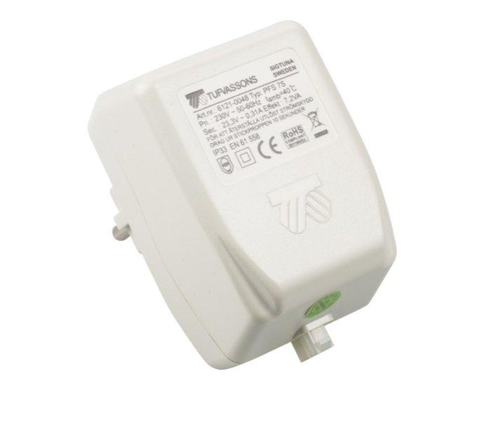 En transformator av märket TUPA med specifikationsetikett på sidan.