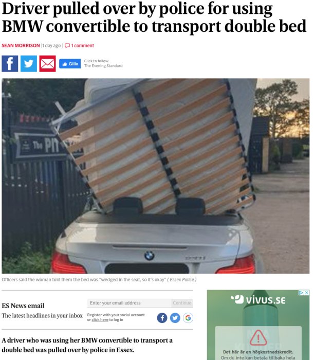 BMW cabriolet med en stor dubbelsäng fastkilad ovanpå bilens baksäte och koffert.