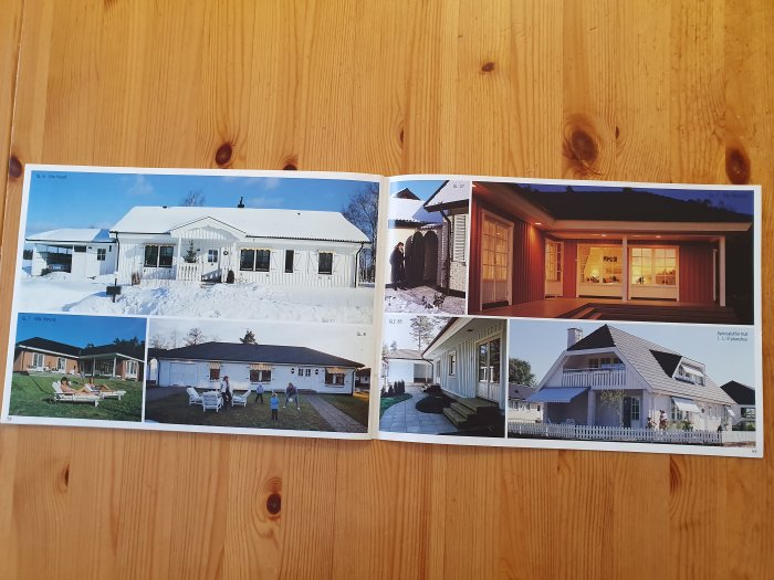 Öppen huskatalog visar olika hustyper på bilder, inklusive vinterbild och interiörvy på kvällen.