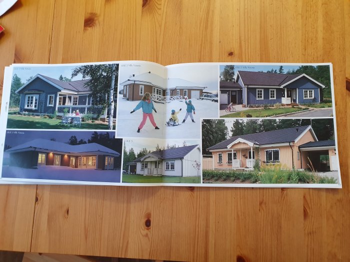 Öppen katalog med bilder på olika husmodeller och människor utomhus.