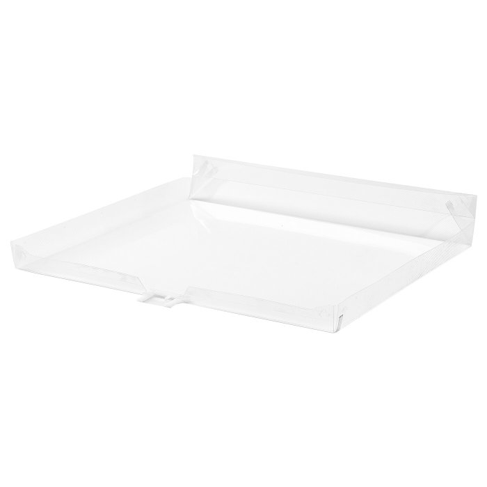 Transparent plastbricka med upphöjd kant och rundad hörnpipa.