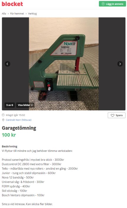 Grön bordsbandsåg av märket Nova 12 står i en verkstad med mönstrat golv.