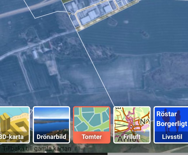 Luftbild med kartläggning av fastighetsgränser och navigationsmeny för val av kartläge, inkluderat "Tomter"-ikon.