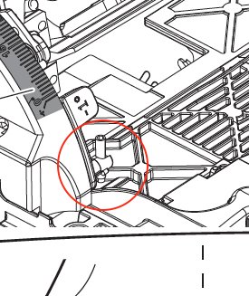Detaljbild av kapsåg med markerad skruv för justering av sågens vinkel till 0 grader.
