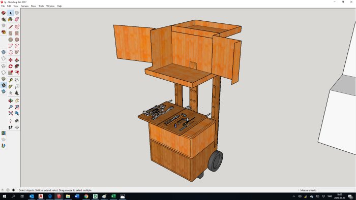 3D-modell av en öppen verktygsvagn med verktyg på övre hyllan i ett CAD-program.