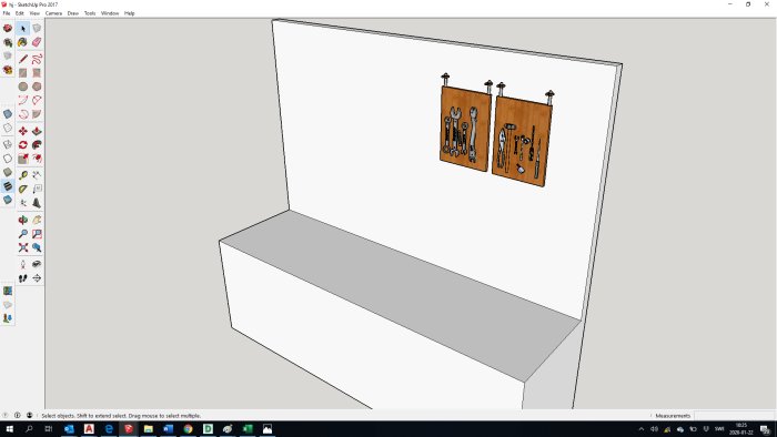 Skärmdump av ett 3D-modelleringsprogram som visar en verktygstavla på en vägg över en arbetsbänk.