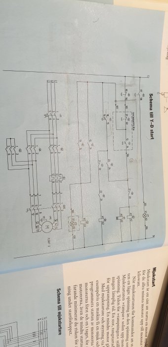 Elektriskt schema för Y_D start med tryckvakt och anslutningar, fotograferad på ett snett underlag.