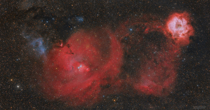 Astrofoto med vidvinkel av Rosett- och Konnebulosan i natthimlen, fotad med kyld monokamera.