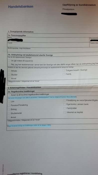Formulär med personuppgifter och frågor om skattehemvist och insättningar hos Handelsbanken.