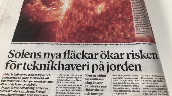 Närbild av en artikel om solens fläckar med rubriken "Solens nya fläckar ökar risken för teknikhaveri på jorden".