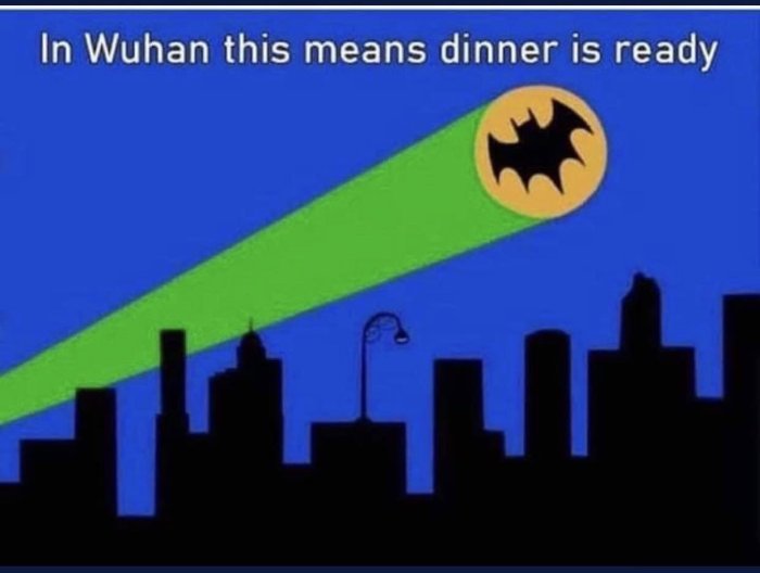 Stiliserad silhuett av stadssilhuett med Bat-Signal i luften och text om måltid.