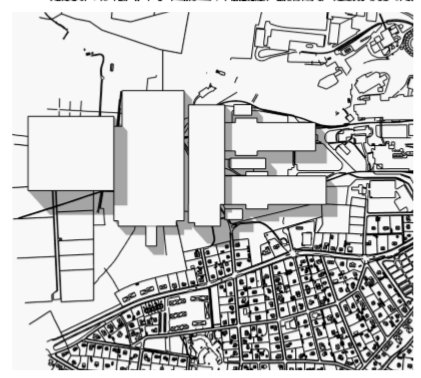 Skiss av en detaljplan som visar stora industribyggnader nära en tät bostadsbebyggelse.