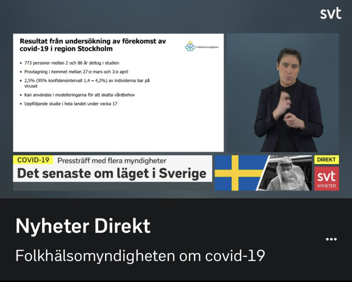 Bild från SVTs sändning av presskonferens om covid-19 med tolk för teckenspråk.