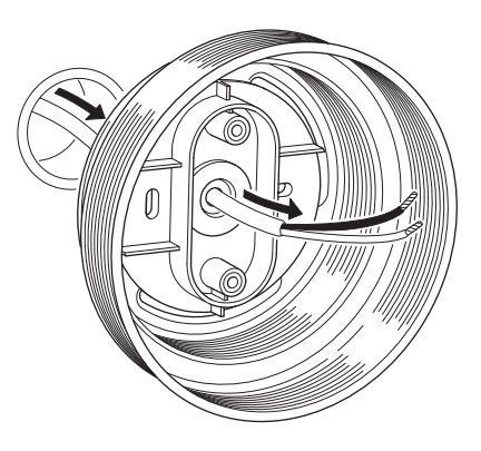 Illustration av en väggmonterad termostat med justeringsvred och temperaturindikatorer.