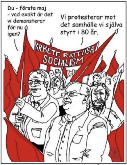 Karikatyr av personer med röda fanor och banderollen "ARBETE RÄTTVISA SOCIALISM" som diskuterar första maj-demonstrationer.