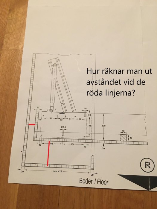 Teknisk ritning av en sängram med måttangivelser, markerade röda linjer och fråga om beräkning av avstånd.