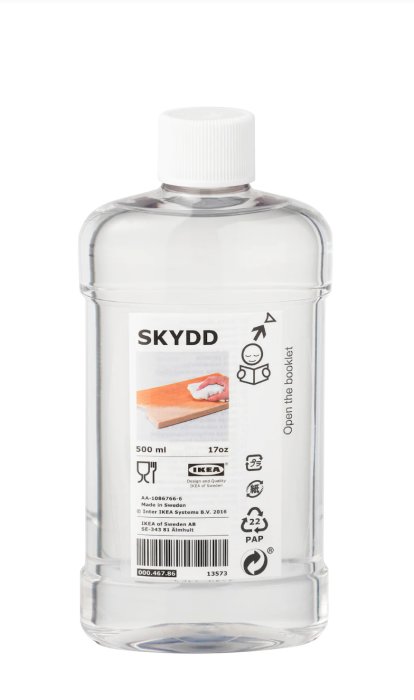 Flaska med livsmedelsgodkänd parafinolja SKYDD från IKEA för behandling av skärbrädor.