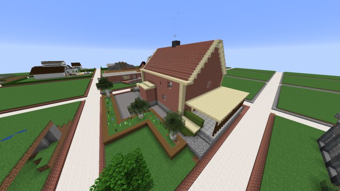 En Minecraft-värld med tegelhus under konstruktion och omgivande byggnader.