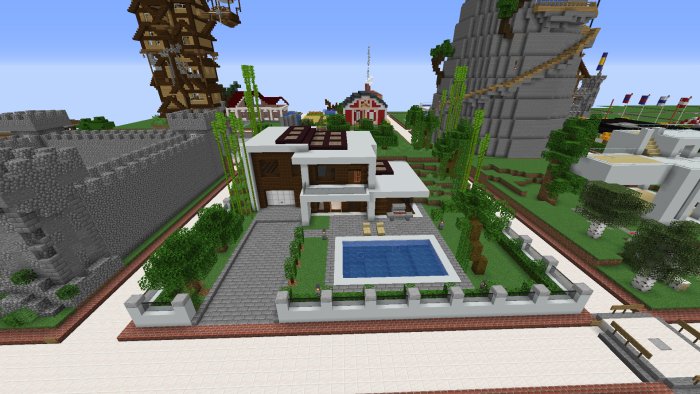 Minecraft-baserad byggnation av ett modernt hus med pool och trädgård.