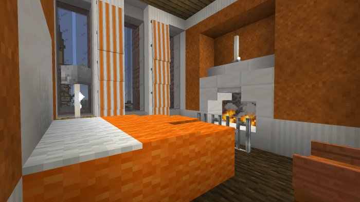 Inre bild av Minecraft-byggnadsprojekt med en säng och eldstad.
