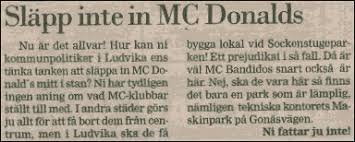 Utklippt tidningsartikel med rubriken "Släpp inte in MC Donalds" och satirisk text.