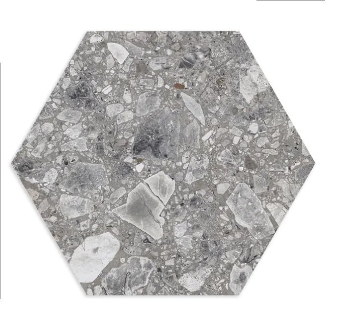 Hexagonalt Terrazzo Retro klinker i mörkgrå nyans med inslag av ljusare stenpartiklar.