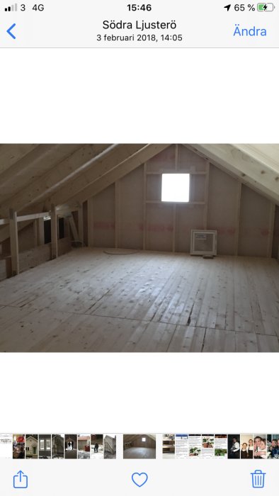 Obearbetad vind för ombyggnad till sovrum med plankgolv, litet fönster och dörr.