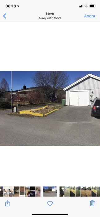 Område markerat med gult som visar var användaren vill placera en mindre mur vid en sluttande trädgård och garageuppfart.