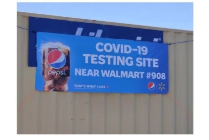 Reklamskylt för Pepsi vid Covid-19-testningsplats nära Walmart #908.