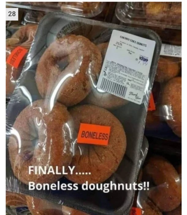 Förpackning med munkar och humoristisk etikett som säger "BONELESS" med texten "Finally.... Boneless doughnuts!!