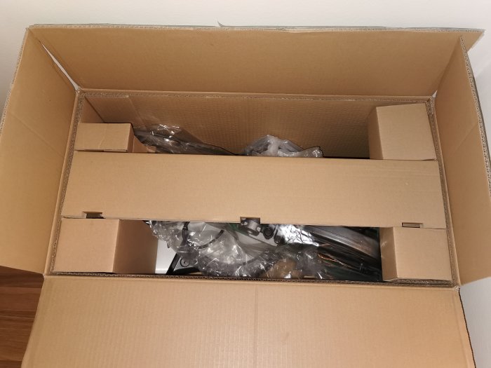 Ny gersåg i kartong, oanvänd, insvept i plast med tillbehör, redo för försäljning.