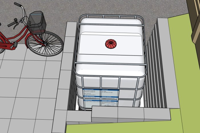 Skiss av planerad cykelparkering med en grävd plats för en IBC-tank omgiven av mursten, nära en röd cykel.