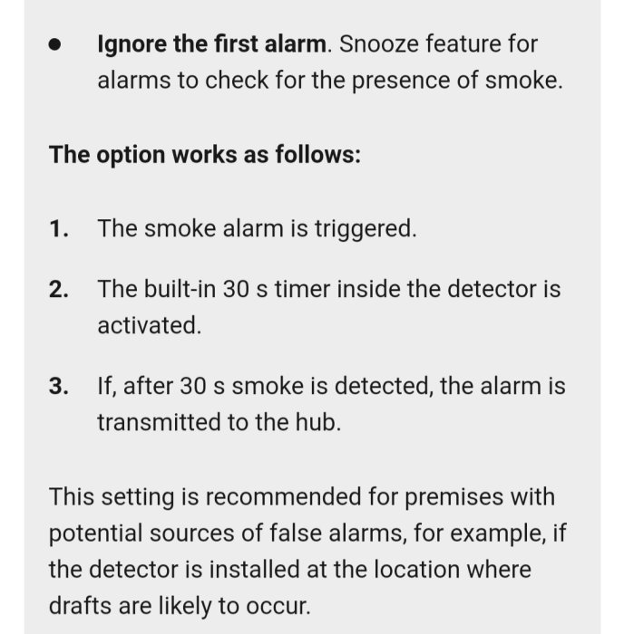 Skärmbild av instruktioner för att ignorera det första larmet från en smart rökdetektor, med en förklaring av snöfunktionen.