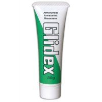 Tub av GlideX armaturfett som används vid service av blandare.