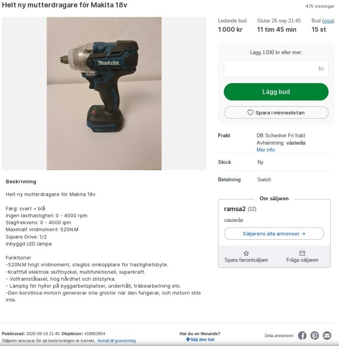 En ny Makita 18v mutterdragare i svart och blått med LED-lampa och batteri, står mot vit bakgrund.
