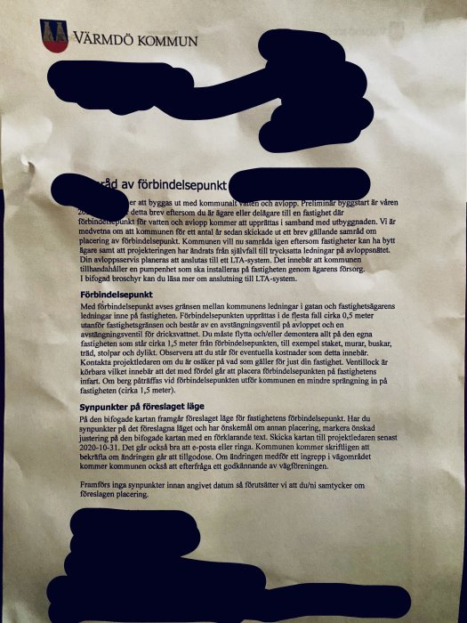 Informationsbrev från Värmdö kommun med svart överstrykningar som döljer personlig information.