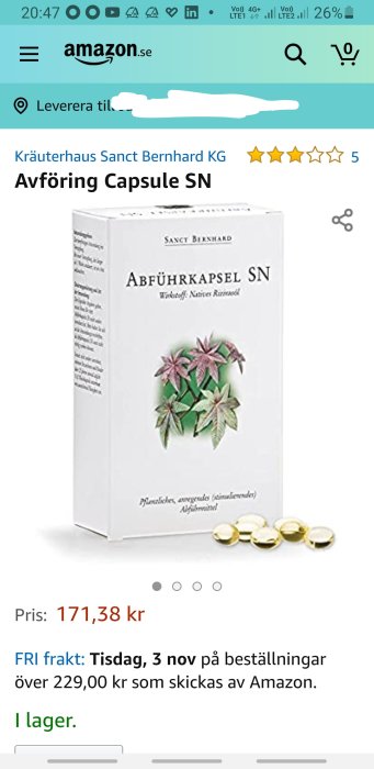 En förpackning av Kräuterhaus Sanct Bernhard KG avföringstabletter och gyllene kapslar framför.