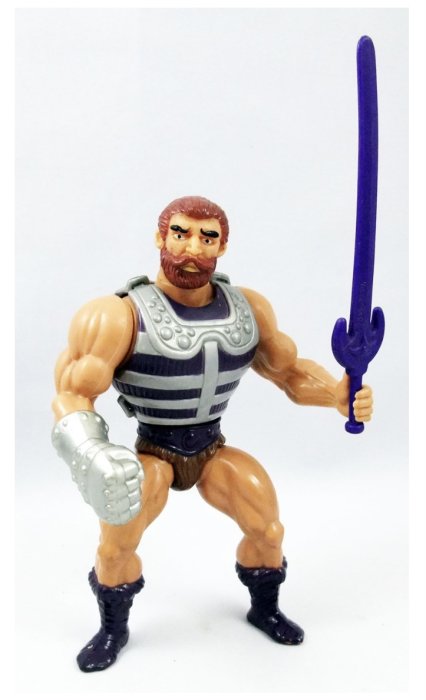 Actionfigur med skägg, metalldetaljer och ett stort blått svärd.