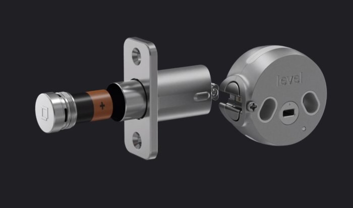 Amerikanskt lås med dörrcylinder och elektroniska komponenter av märket Level.
