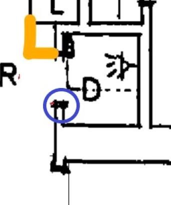 Del av ritning med blåmarkerad stubbe intill duschutrymme som används för att fästa en dörr.