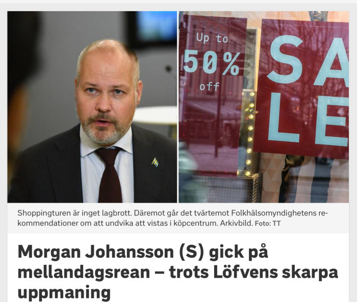Man i kostym med Sveriges flagga på kavajen framför skyltfönster med texten "SALE up to 50% off".
